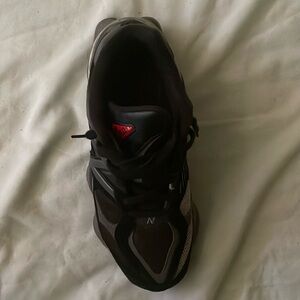 New balances size 9 and on the side a Adidas tracks joggers (Small- long)